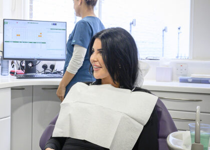 Orthodontist consulting with a patient