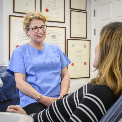 Orthodontist with a patient in clinic